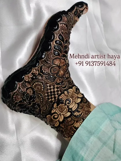 Another angle of the intricate foot design, showing the incredible detail and precision of the line work.