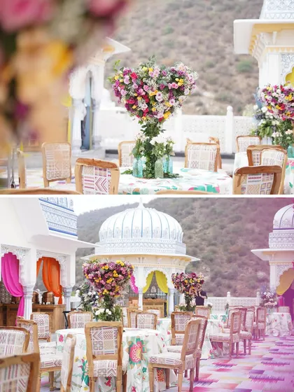 A two-part image showing the beautiful outdoor setting at The Leela Palace, Jaipur. The top shows a close-up of the heart-shaped centerpiece, while the bottom gives a wider view of the palatial architecture and seating.