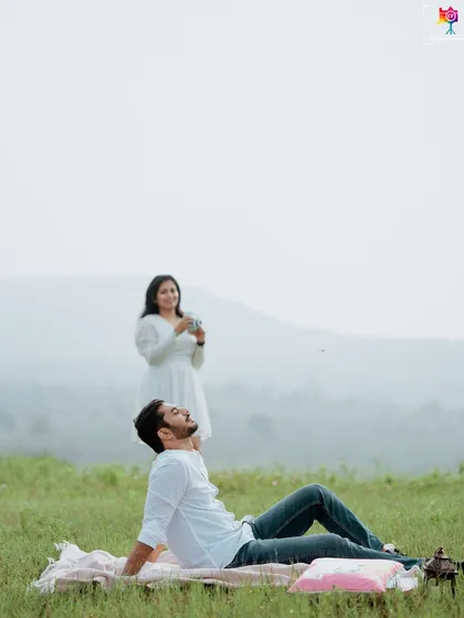 A relaxed portrait from a picnic, capturing a natural moment of peace and contentment.