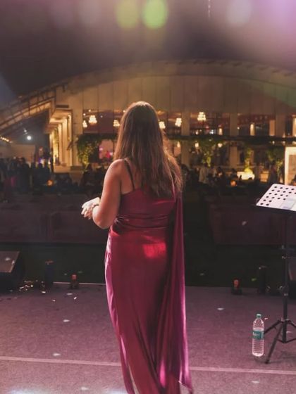 Our lead singer taking in the view from the stage before a performance. We love the scale and beauty of Indian weddings and feel privileged to add our music to the celebration.