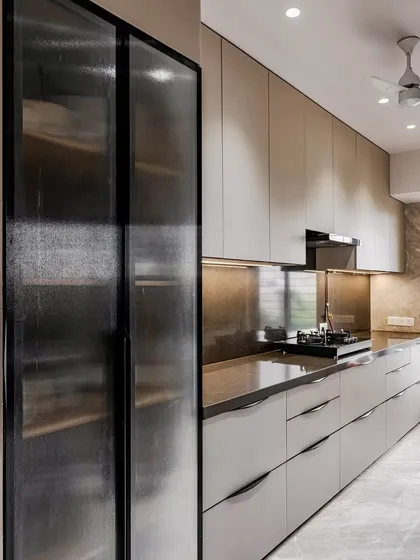 Another angle of the fluted glass pantry, showcasing its elegant design and ample storage capacity.