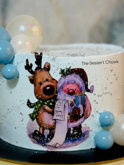 A tall and festive Christmas-themed cake with a delicious pineapple fresh fruit flavour inside. A light and refreshing choice for any celebration.