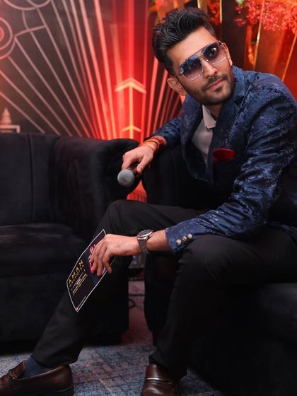 The spark you see on stage begins long before the spotlight hits. Here's a candid moment, soaking in the event's atmosphere before my performance.