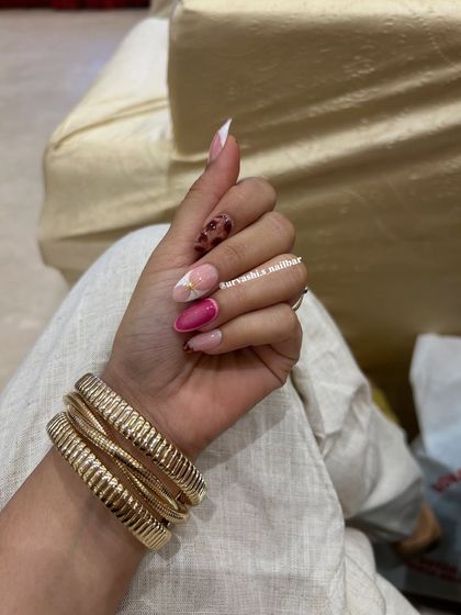 A fun and eclectic set combining a pop of magenta, a touch of tortoiseshell, and a modern white swirl. This shows how you can mix and match different styles for a unique look.