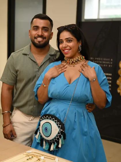 The perfect moment of discovery. A guest tries on a statement choker at a private jewelry salon in our Gurgaon studio, finding a piece that resonates with her personal style.