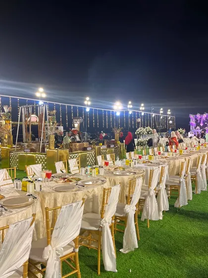 A wide shot of the dining area and the buffet counters, showing the full scale of a large wedding reception I catered.