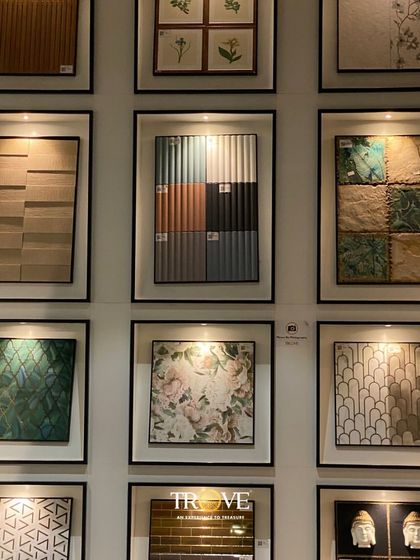 Our tiles are displayed like works of art in a gallery. This wall features a collection of framed tiles, highlighting various patterns, textures, and color palettes to help you find your perfect match.