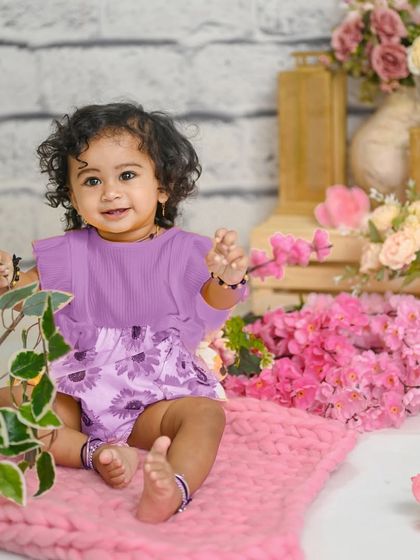 A duplicate of image 13, a lovely first birthday portrait.