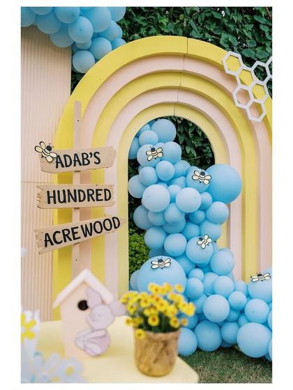 Another look at the custom 'Adab's Hundred Acrewood' sign, showing the detailed craftsmanship that goes into our personalized party elements.