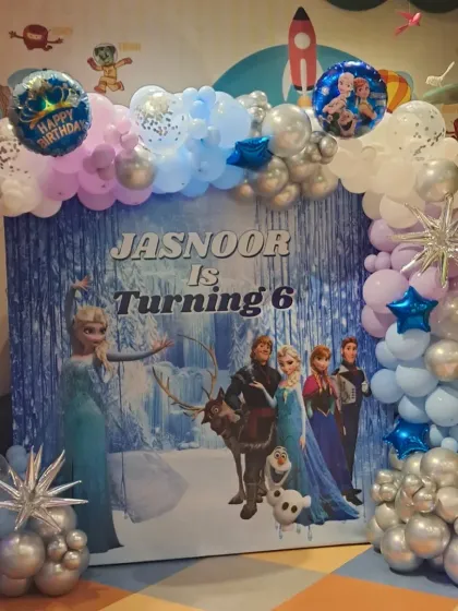 We bring fantasies to life with our fully themed party decorations. This Frozen-themed setup, complete with a custom backdrop and balloon arch, created a magical winter wonderland for Jasnoor's 6th birthday.