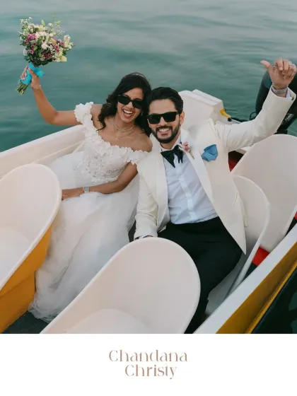 Pure celebration on the water. Chandana and Christy's joy is infectious in this shot from their island wedding adventure. It’s a perfect example of a fun, dynamic portrait that captures the energy of the day.