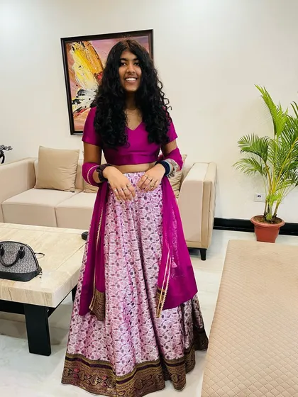 This lehenga holds a special story. We crafted it from a saree passed down through three generations, turning a family heirloom into a wearable piece of history for this happy young client.