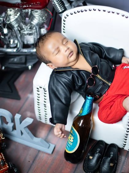 The aftermath of a rock and roll lifestyle. This shot captures the peaceful side of our little star, fast asleep on his mini armchair.