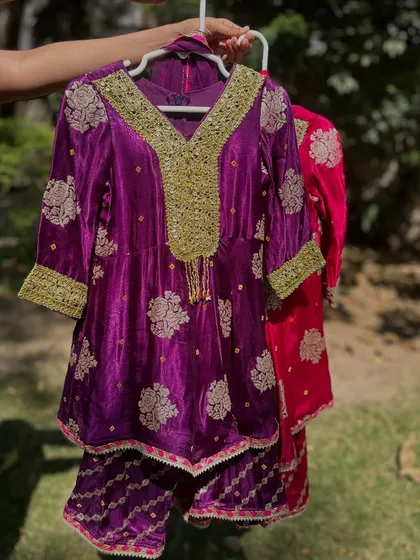The purple Gota Patti sharara set. The color is so regal and perfect for a wedding.