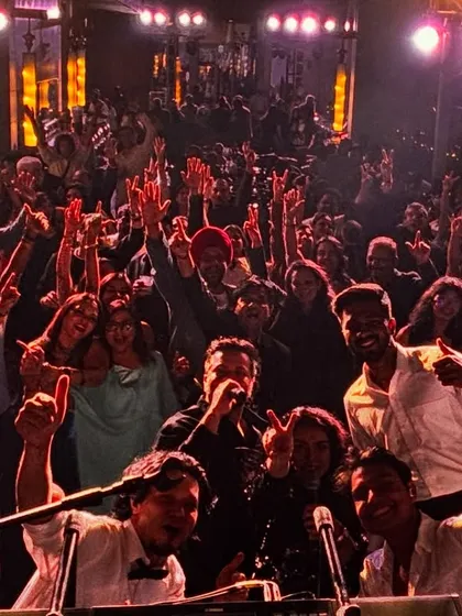 Another angle from a packed indoor club gig. The room is electric, with everyone's hands in the air. This is the intimate, high-energy party atmosphere we are known for creating.