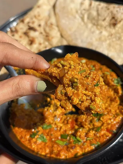 Another bite of my delicious Paneer Bhurji with Roti. It's a wholesome and flavourful dish that's perfect for any meal.