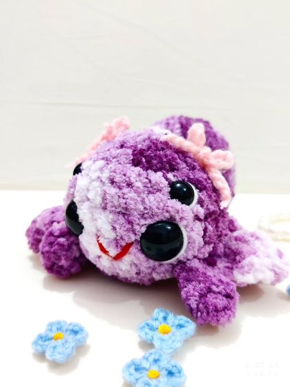 Made with variegated purple velvet yarn, this spider is more cute than creepy.