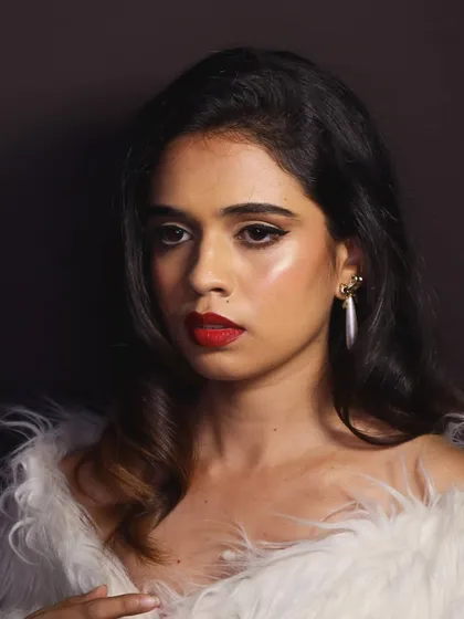 Another shot of the 1950s glamour look, showing the soft waves in the hair and the classic makeup from a different angle.