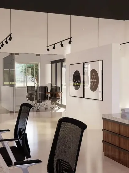 This render shows the view from the open employee workstations in the marketing office concept. The cabins are enclosed in glass to provide semi-privacy while maintaining the illusion of a large, open-plan layout, connecting the entire team visually.