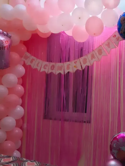 Another perspective of the pink-themed bedroom decoration for a newborn's welcome, perfect for creating a warm and loving atmosphere.