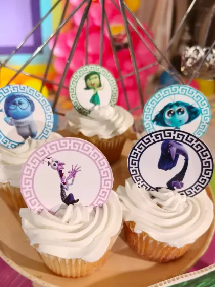 Another look at the "Inside Out" cupcakes, displayed and ready for the party. I can create toppers for any character or theme you have in mind.