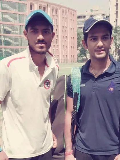 Sudarshan with a fellow cricketer at the academy. The supportive and competitive environment here helps players push each other to new heights.