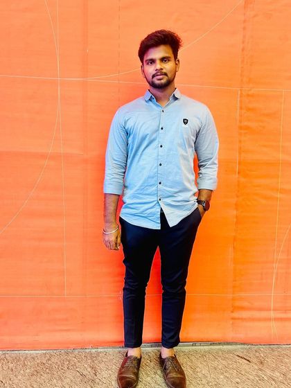 A simple portrait against a bright orange wall, taken during my visit to the Snow City area.