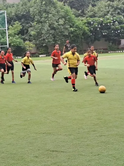 Girls from different houses compete with passion during the Inter-House Football Tournament. We are committed to promoting girls' participation in all sports, fostering an environment of equality and empowerment.