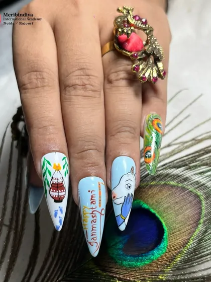 The complete Janmashtami nail art set, featuring Bal Krishna, a pot of makhan, and peacock feather motifs. This is a prime example of the narrative nail art we teach.