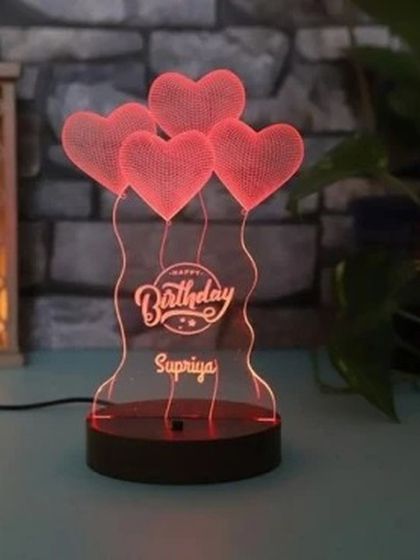 Wish someone a happy birthday with a personalized LED lamp designed just for them. This one features a festive balloon design and can be customized with the birthday person's name.