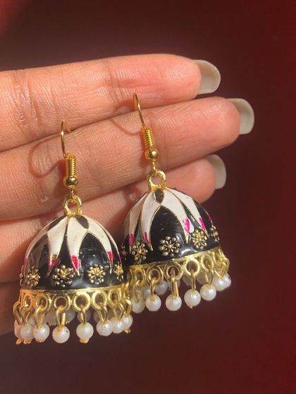 Another look at the black Meenakari hook earrings. These are super lightweight and easy to wear, adding a touch of elegance to any outfit.