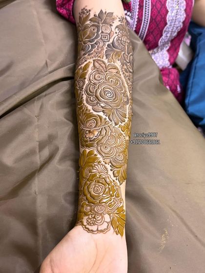 The full view of the rose-themed arm design.