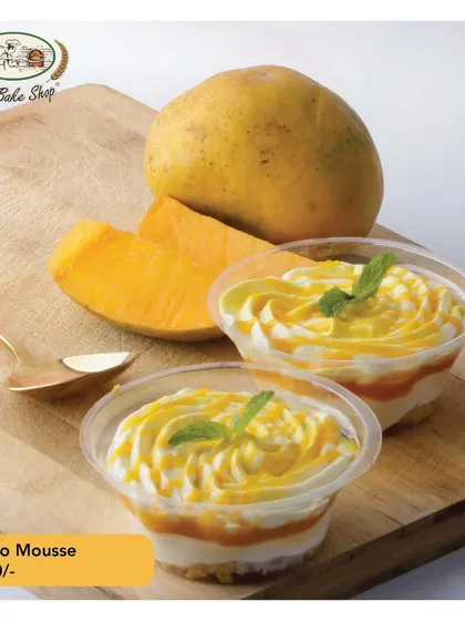 Our individual Mango Mousse cups are perfect for parties or a personal treat. They are light, creamy, and bursting with mango flavor.