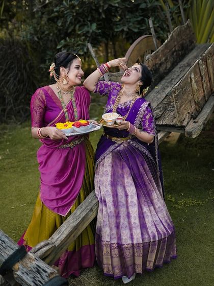 A fun, candid moment from a festival photoshoot, showing the playful and joyful side of our traditions.