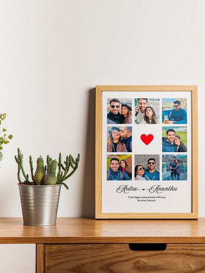 The custom couple's photo collage frame, displayed elegantly on a wooden desk. It's a timeless piece of decor that celebrates love.