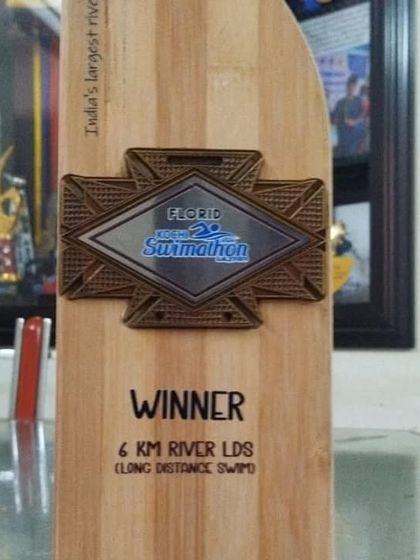 The trophy from the 6 km River Swimathon. This represents countless hours of training and a disciplined approach to nutrition. For endurance athletes, every meal and snack is a step towards the finish line.