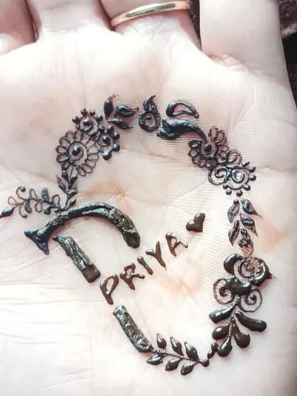 A beautiful design for 'Priya' with the initial 'P' forming a heart.