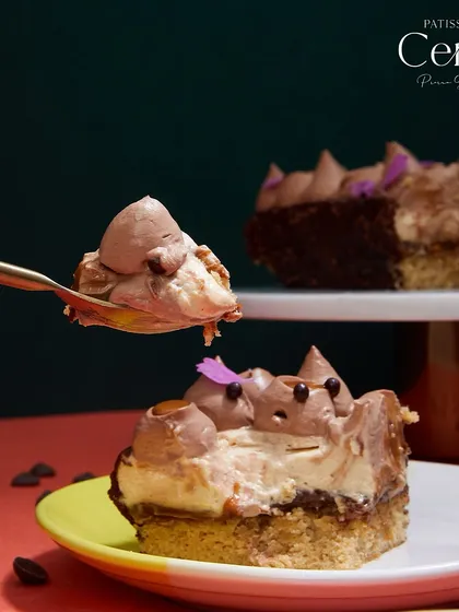 A spoonful of the "Go Nuts for Hazelnuts" shows the light texture of the mousse and the richness of the layers beneath.