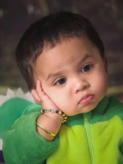 The classic grumpy pout. I believe in capturing all the moods, because these adorable, serious expressions are just as much a part of their story.