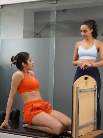 A moment between exercises with Janhvi Kapoor. I believe in creating a supportive environment where we can discuss goals and refine technique, ensuring every session is personalized and effective.