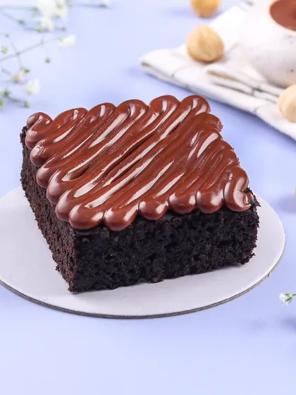 Our Nutella Brownie is pure indulgence. It's a rich, fudgy brownie base with a thick, generous swirl of Nutella on top. It's simple, decadent, and absolutely delicious.