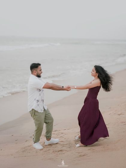 A fun, spinning dance on the sand. I love capturing the energy and movement that shows a couple's playful side.
