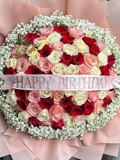 Another angle of the grand round bouquet, highlighting the custom "Happy Birthday" ribbon that makes this stunning arrangement a truly personal gift.