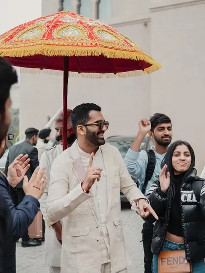 Guests arriving and dancing at the Fairmont Jaipur, ready to kick off the wedding festivities. We ensure a high-energy welcome for everyone.