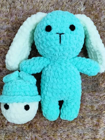A cute bunny made from soft blue velvet yarn. This material is very gentle and perfect for babies.
