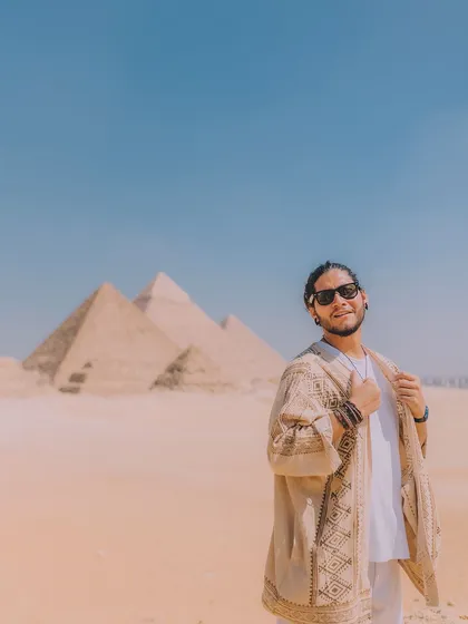 This self-portrait in front of the Great Pyramids of Giza shows my ability to create striking travel content anywhere in the world. It demonstrates how I integrate myself or a subject into iconic landscapes to create aspirational lifestyle imagery.