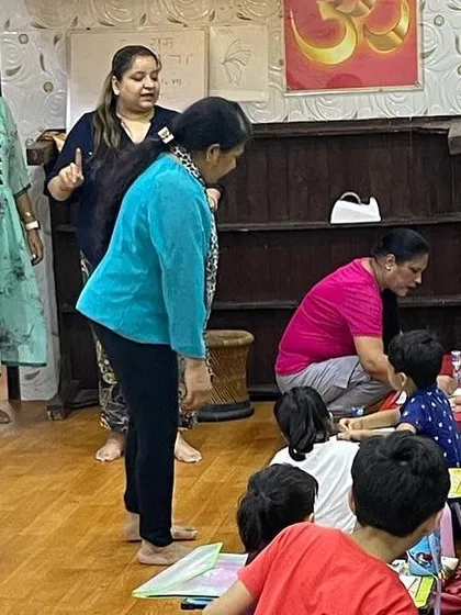Our team of teachers collaborating to ensure a smooth and productive art session for the children.
