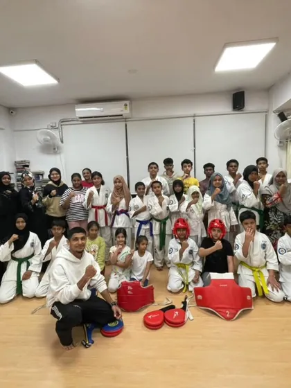 Welcome to the XMF family. This is a group of dedicated students after a tough inter-school competition, showing the mix of ages and the strong community spirit we share.