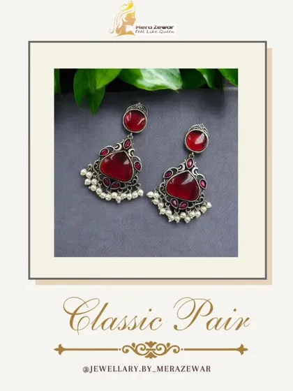 This version of the classic dangle earrings comes in a deep red. It's a passionate and bold color, perfect for making a confident style statement.