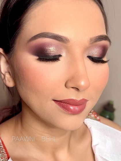 An in-between shot of this gorgeous glittery plum eye look I created for a client.